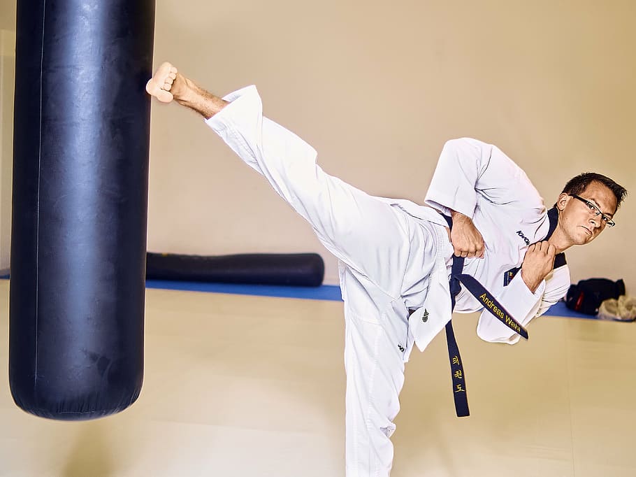 man kicking heavy bag, taekwondo, fight, box, leg, sport, exercising, HD wallpaper