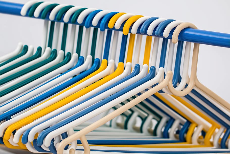 assorted-color plastic clothes hanger lot, clothes hangers, coat hangers