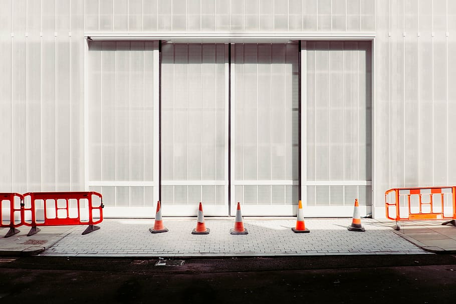 orange traffic cones beside building at daytime, near, wall HD wallpaper