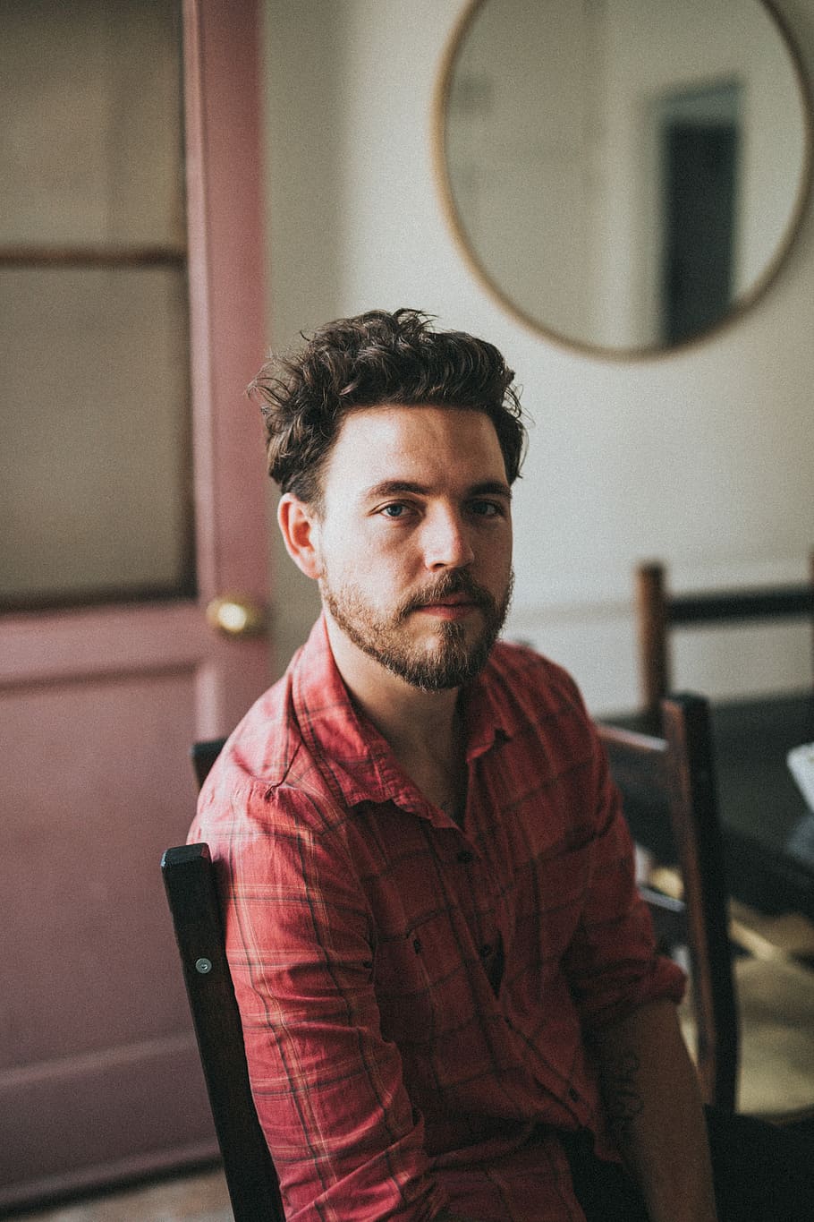 man sitting on chair, beard, portrait, looking, hairstyle, guy HD wallpaper