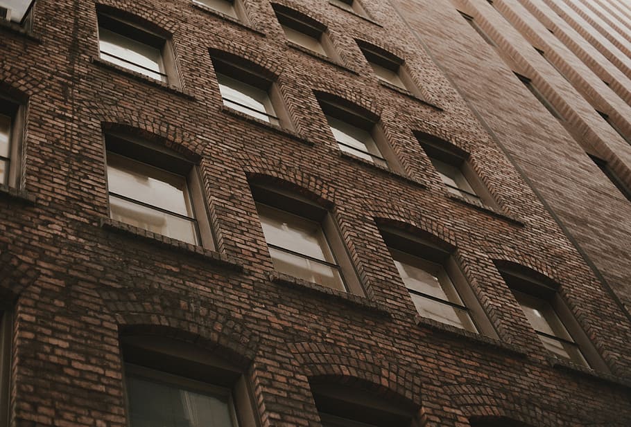 gray concrete brick wall building, low angle photography of brown concrete building HD wallpaper