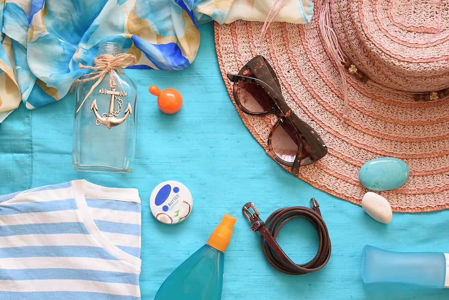 flat lay photography of sunglasses, belt, bottle, and soap HD wallpaper