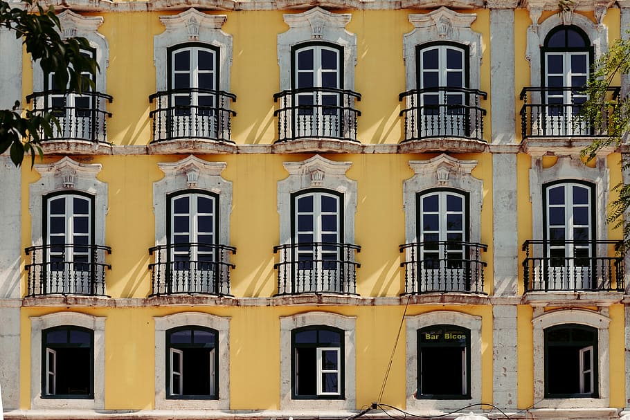 yellow and gray painted concrete building, yellow and white 3-storey house HD wallpaper