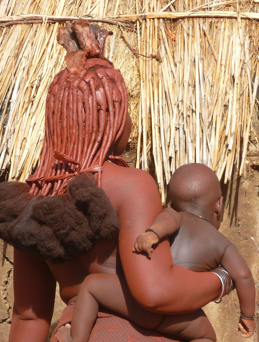 woman carrying child on her right side, himba, namibia, africa HD wallpaper