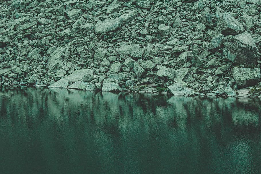 Rocks Near Calm Body Of Water, lake, river, rocky, serene, tranquil HD wallpaper