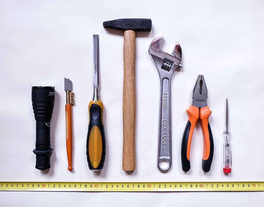 seven assorted-color handheld tools on white background, work HD wallpaper