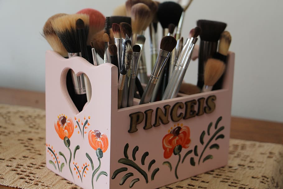pink floral wooden rack filled with make-up brush lot, brushes HD wallpaper