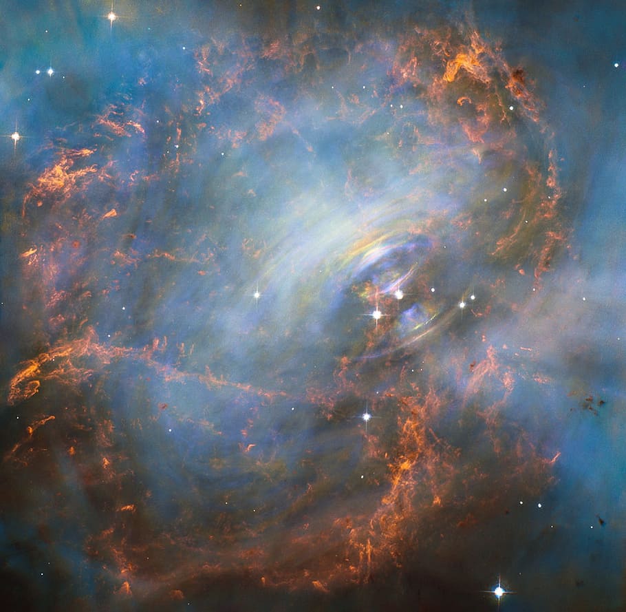 close photo of blue and brown fire painting, crab nebula, heart