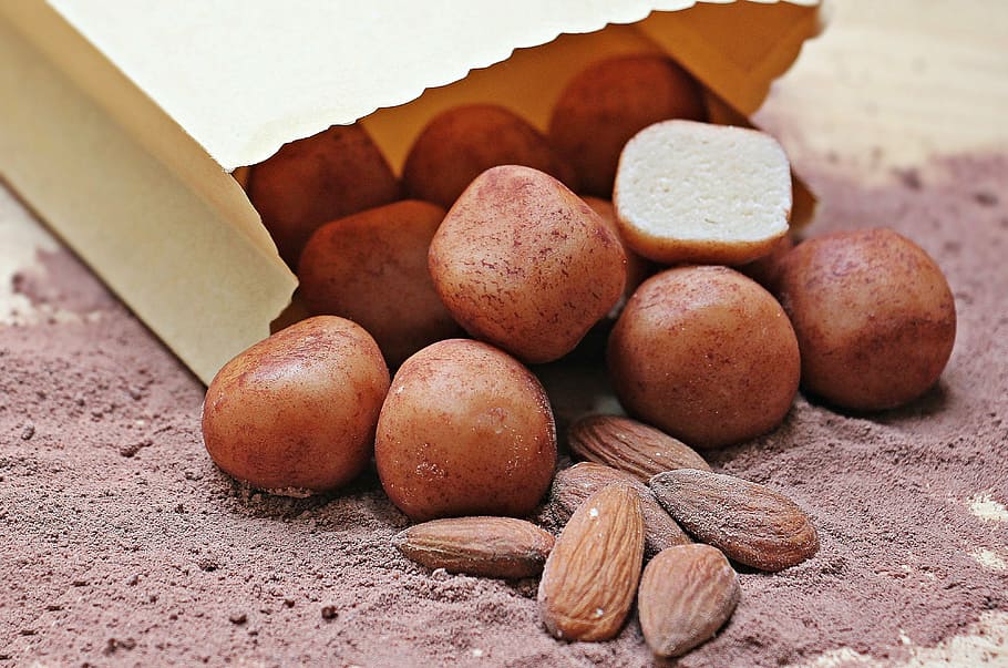 almonds on chocolate powder, marzipan potatoes, sweet goods, delicious, HD wallpaper