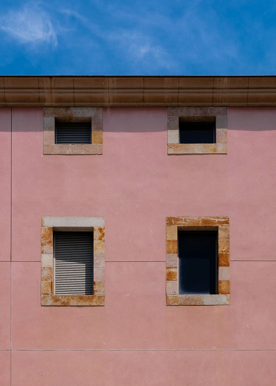 minimalist photography of concrete building with four windows, pink painted wall HD wallpaper