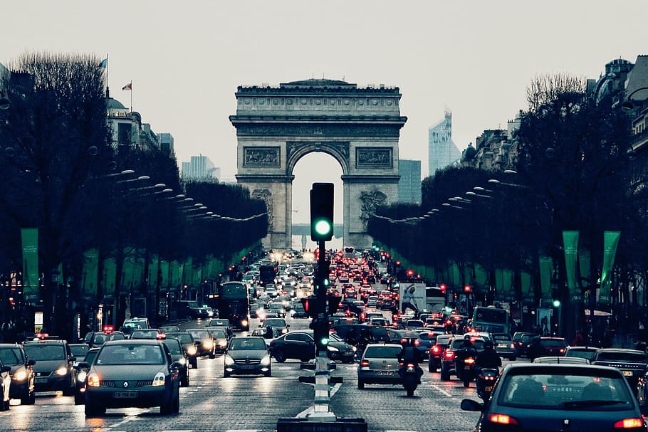photo of arc de triomphe with vehicle passing by, places, landmark
