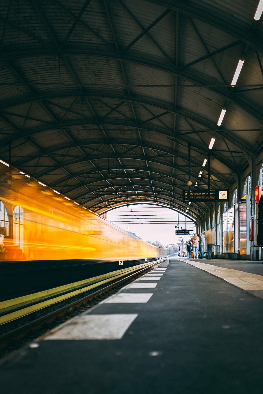 train passing by on train station at daytime, time lapse photography of subway train HD wallpaper