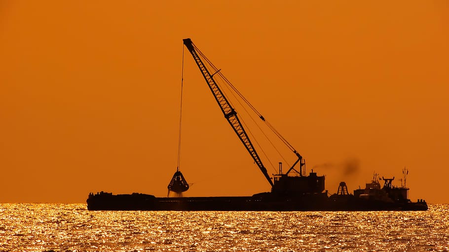 dredger, floating platform, sunset, shadows, dredging, barge