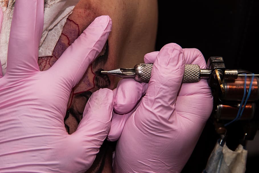 person tattooing on human skin, Shoulder, human body part, pink color HD wallpaper