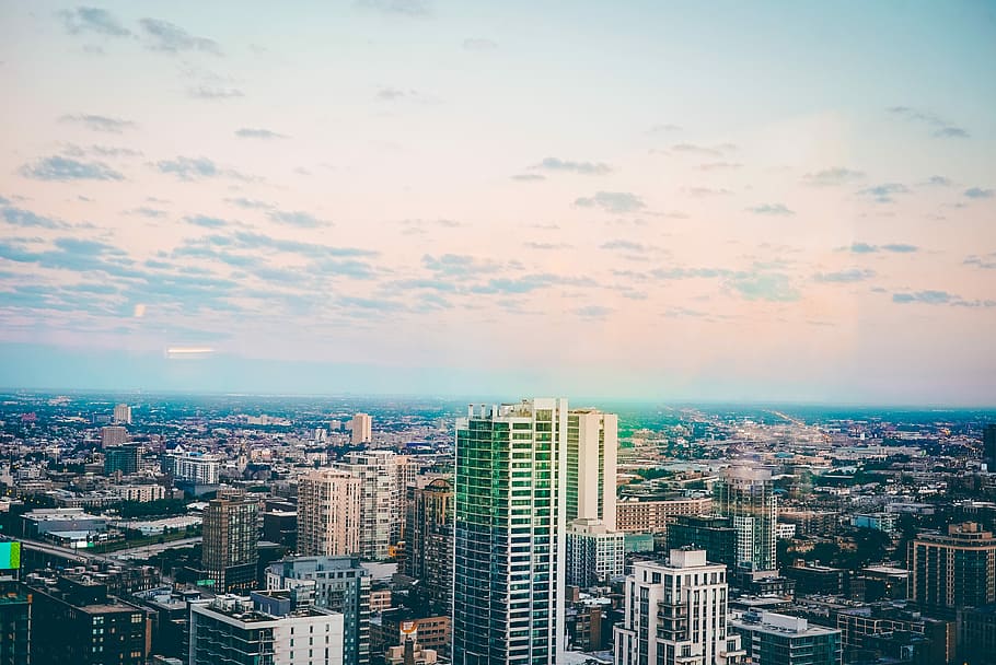 assorted buildings under blue sky, bird'e eye photography of building HD wallpaper