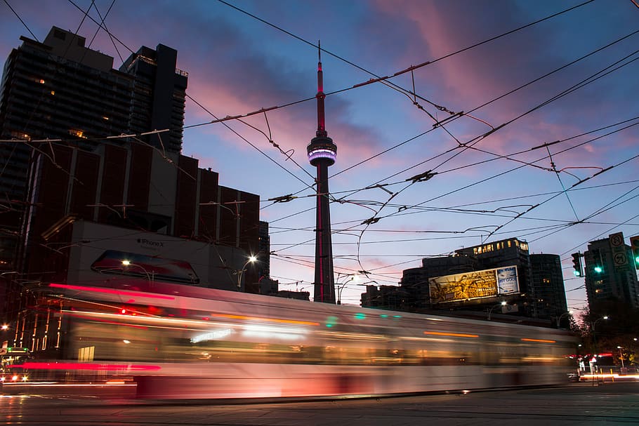 time lapse photography of a train, CN tower, building, toronto HD wallpaper
