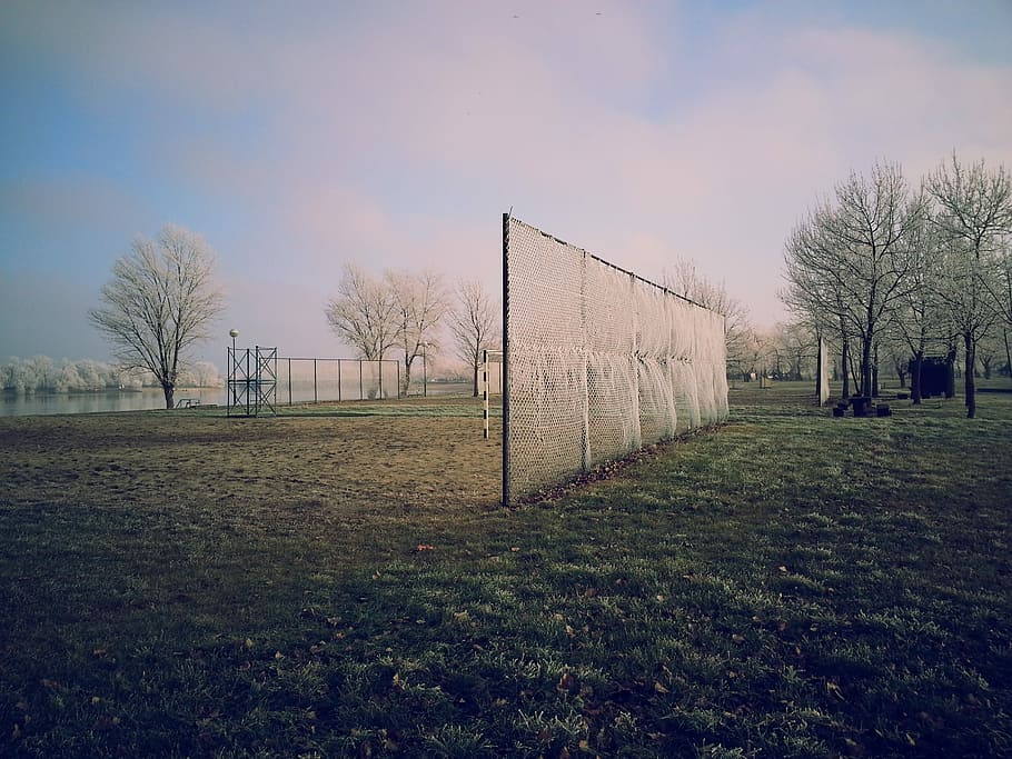 black and white fence on green field grass during daytime, outdoors HD wallpaper