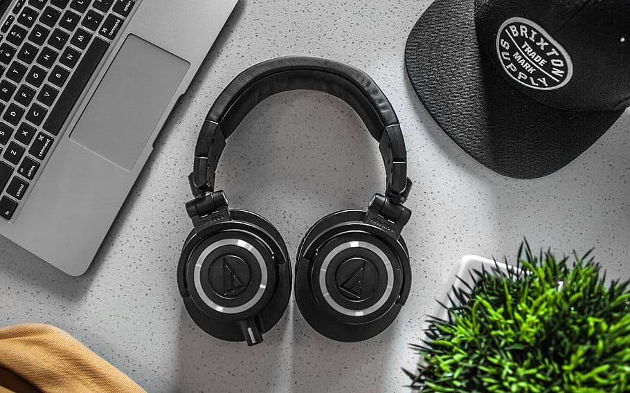 Black Wireless Headphones On White Table, cap, computer, electronics HD wallpaper