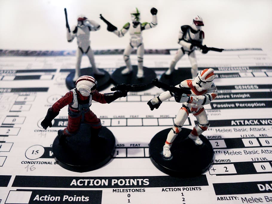 five Star Wars figurines on white printer paper, rpg, game, play