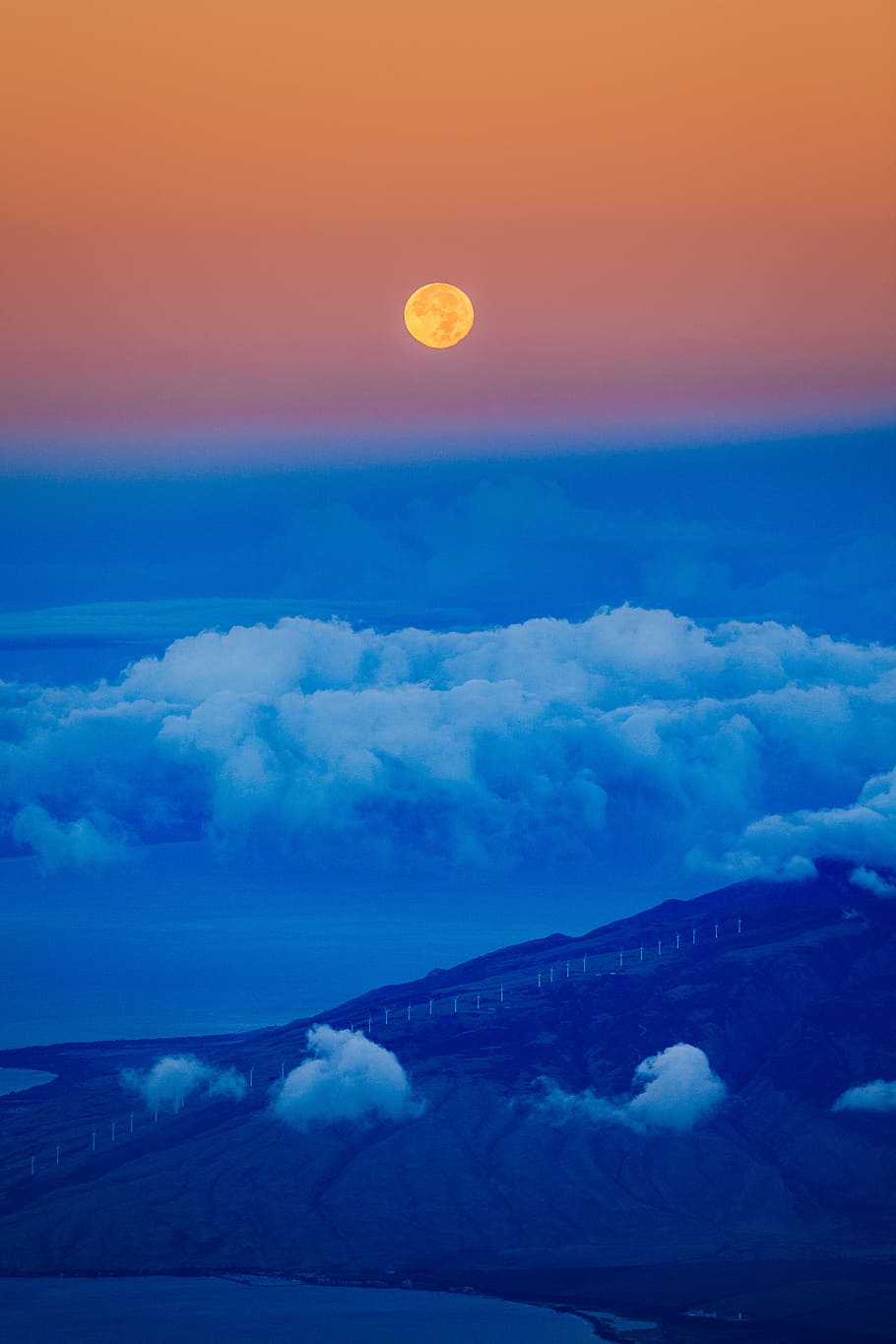 full moon and white clouds, green covered mountains under white cloudy sky HD wallpaper