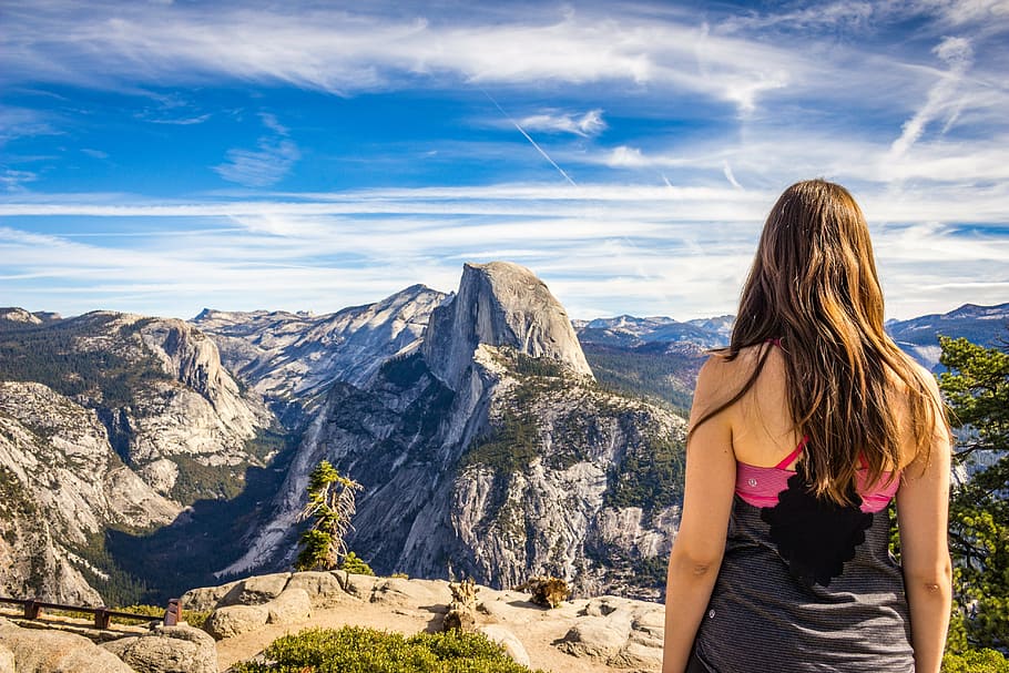woman standing on hill near mountains, adventure, daylight HD wallpaper
