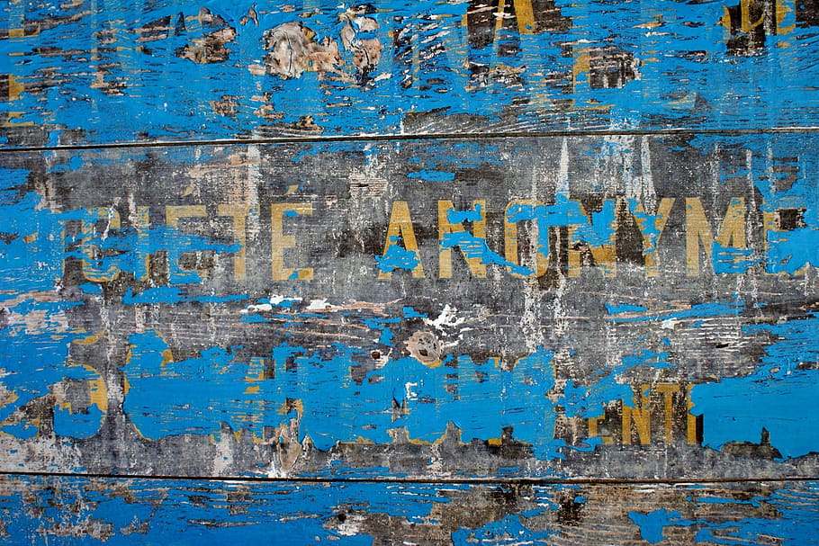 blue and brown wooden painted signage, old house, background