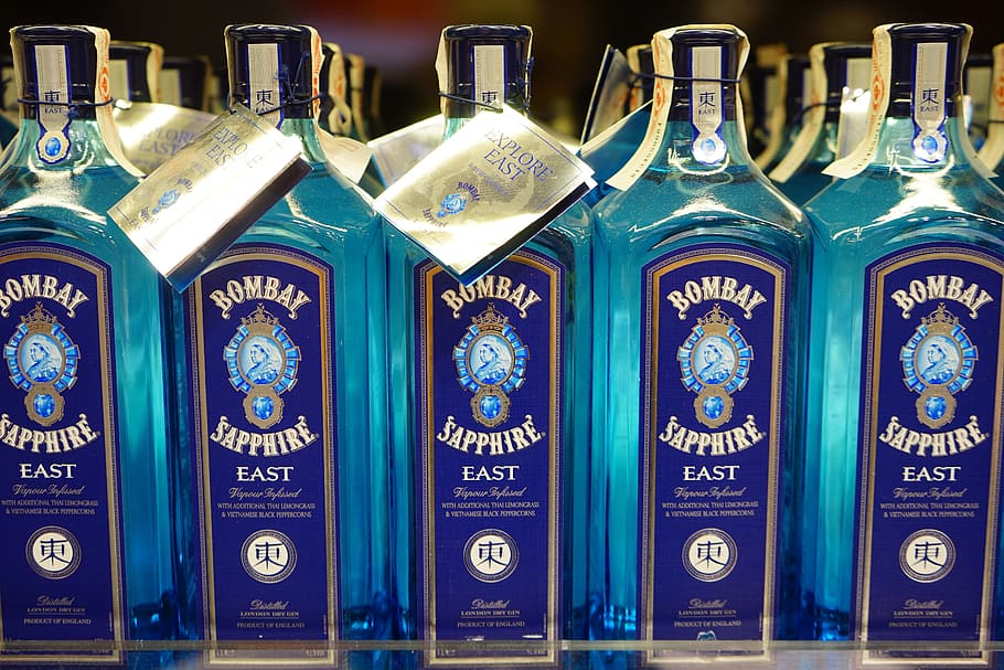 selective focus photography of Bumbay Sapphire East bottles, Gin