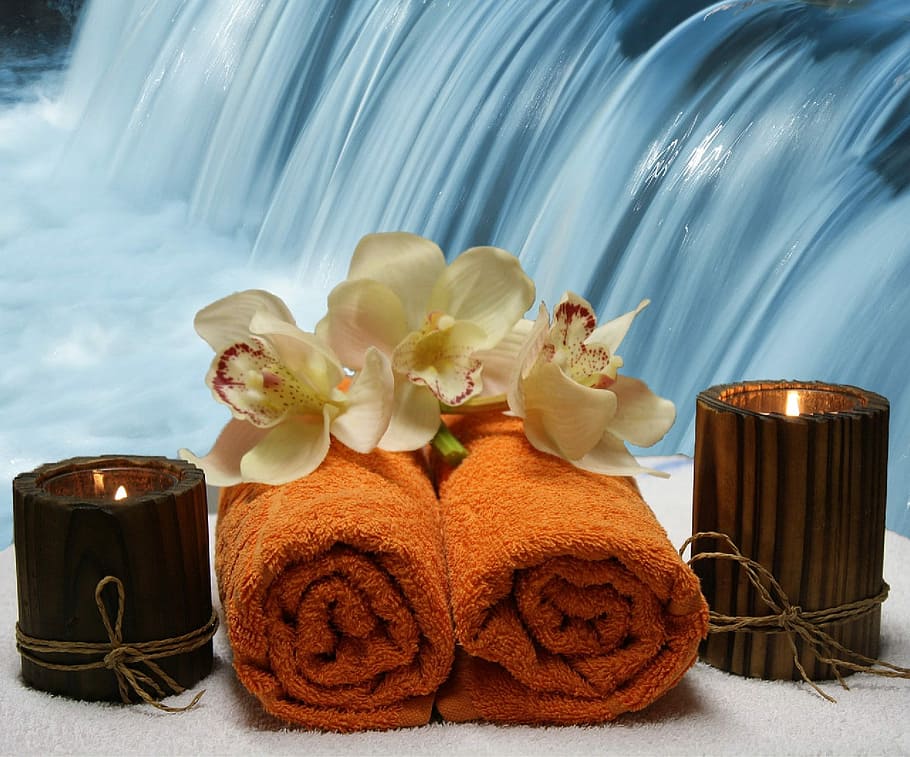 two candlelight on brown glass votive, wellness, relaxation HD wallpaper