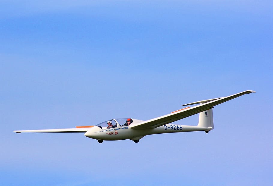 people riding on white plane, air sports, motorsegler, pilot