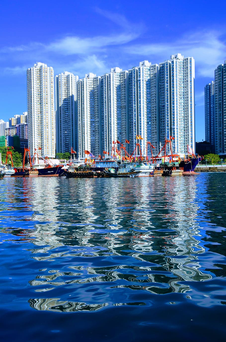 hong kong, skyscraper, reflection, modern, asia, fishing, boat HD wallpaper