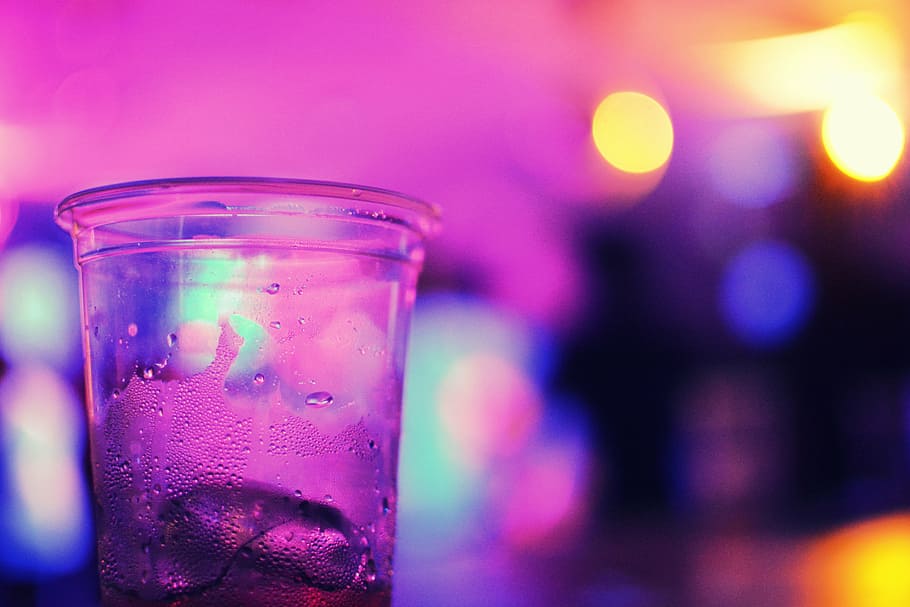 bokeh photography of drinking glass, almost, empty, clear, plastic HD wallpaper