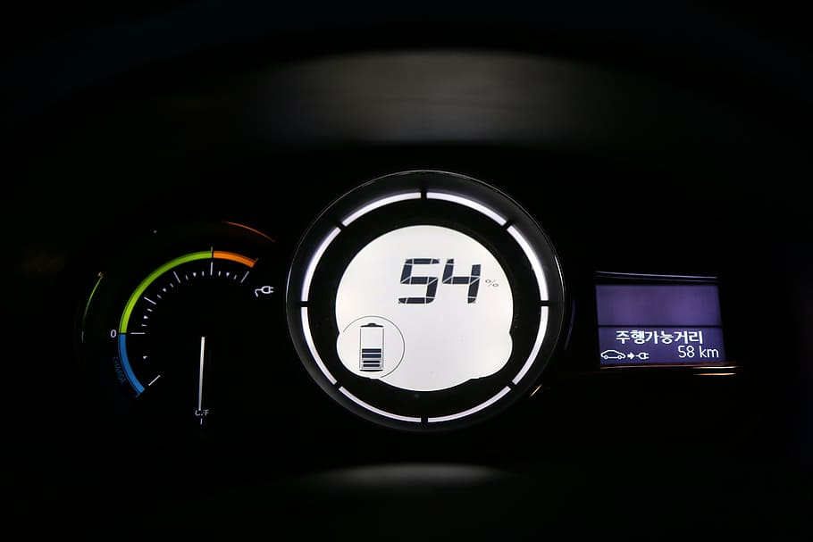 digital speedometer during night time, electric cars, charging
