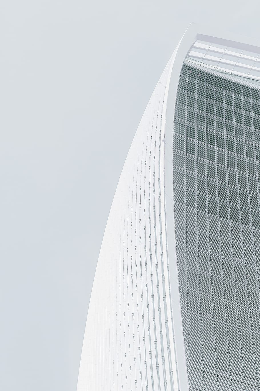 white concrete multi-storey skyscraper at daytime, low angle view of white building HD wallpaper
