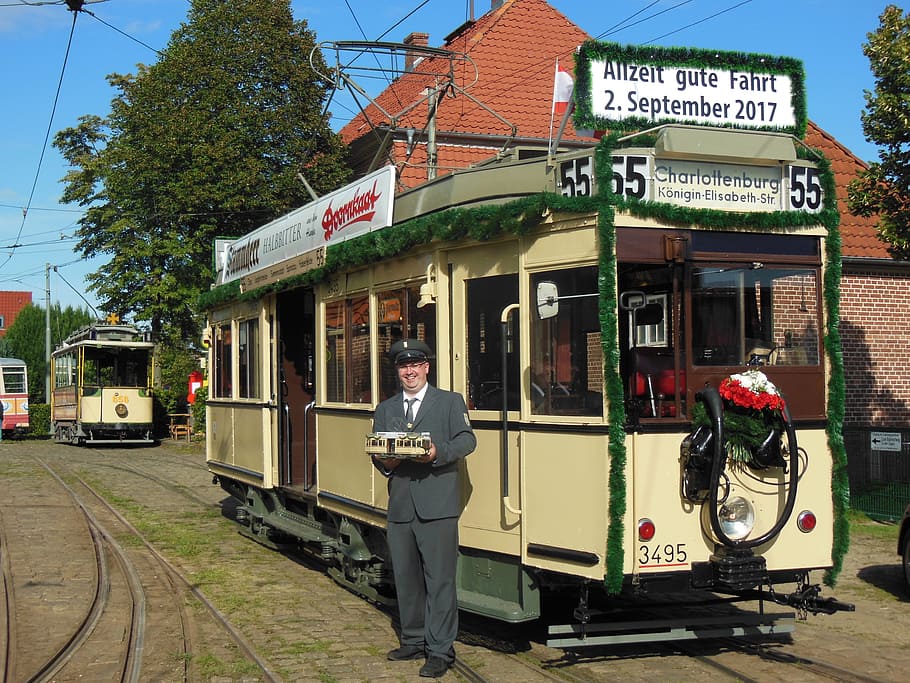 man standing beside train, technology, tram, historically, museum HD wallpaper
