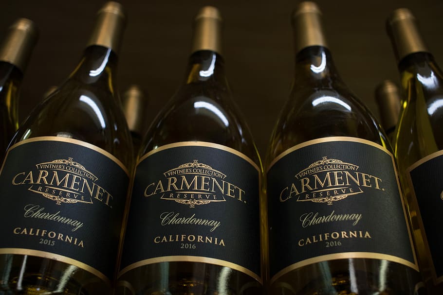 three Carmenet California bottles, selective focus photography of Carmenet California bottles HD wallpaper