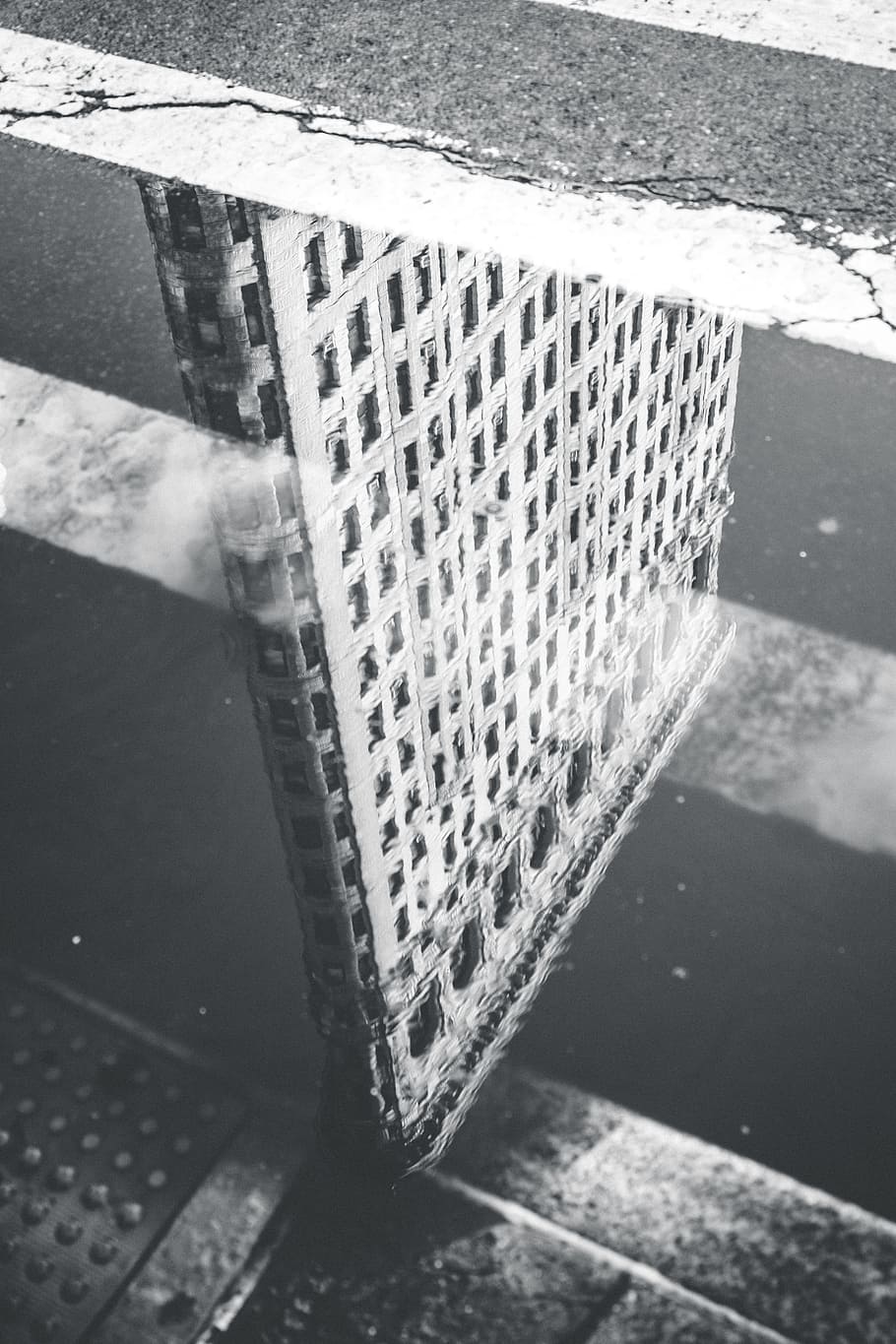 grayscale photography of reflection of building on body of water, grayscale photo of concrete building reflecting on water HD wallpaper