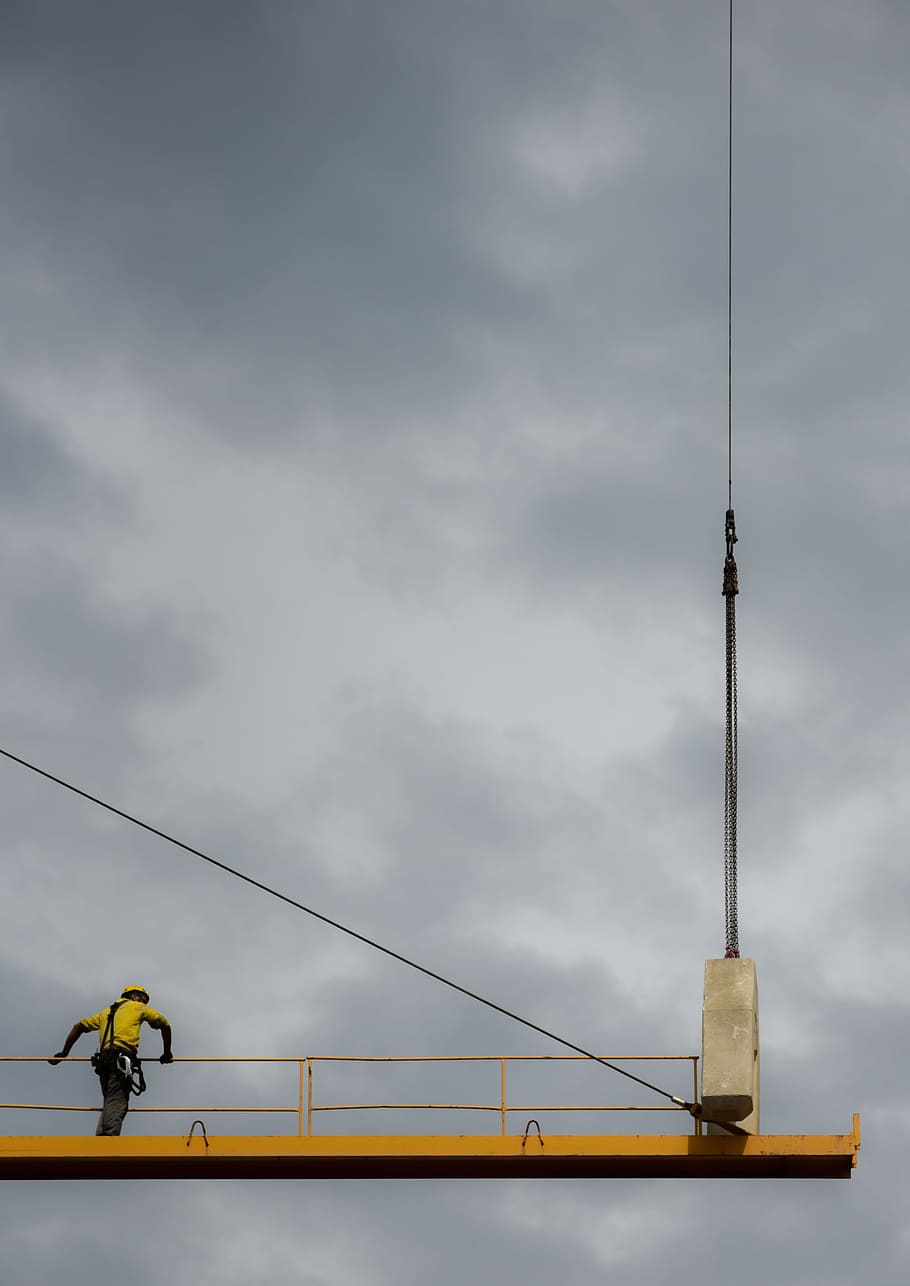 Equilibrio, man standing on tower crane, structure, construction HD wallpaper