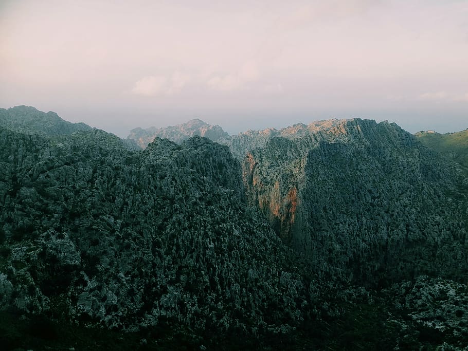 mountain range under grey cloudy skies, landscape, peak, summit HD wallpaper