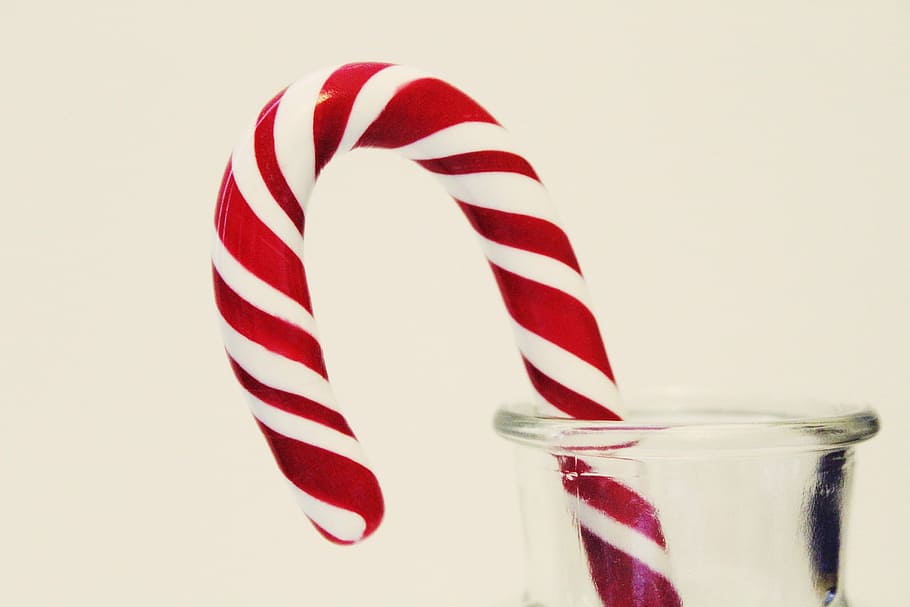 close-up of candy cane on glass jar, sweet, sugar, sweetness HD wallpaper