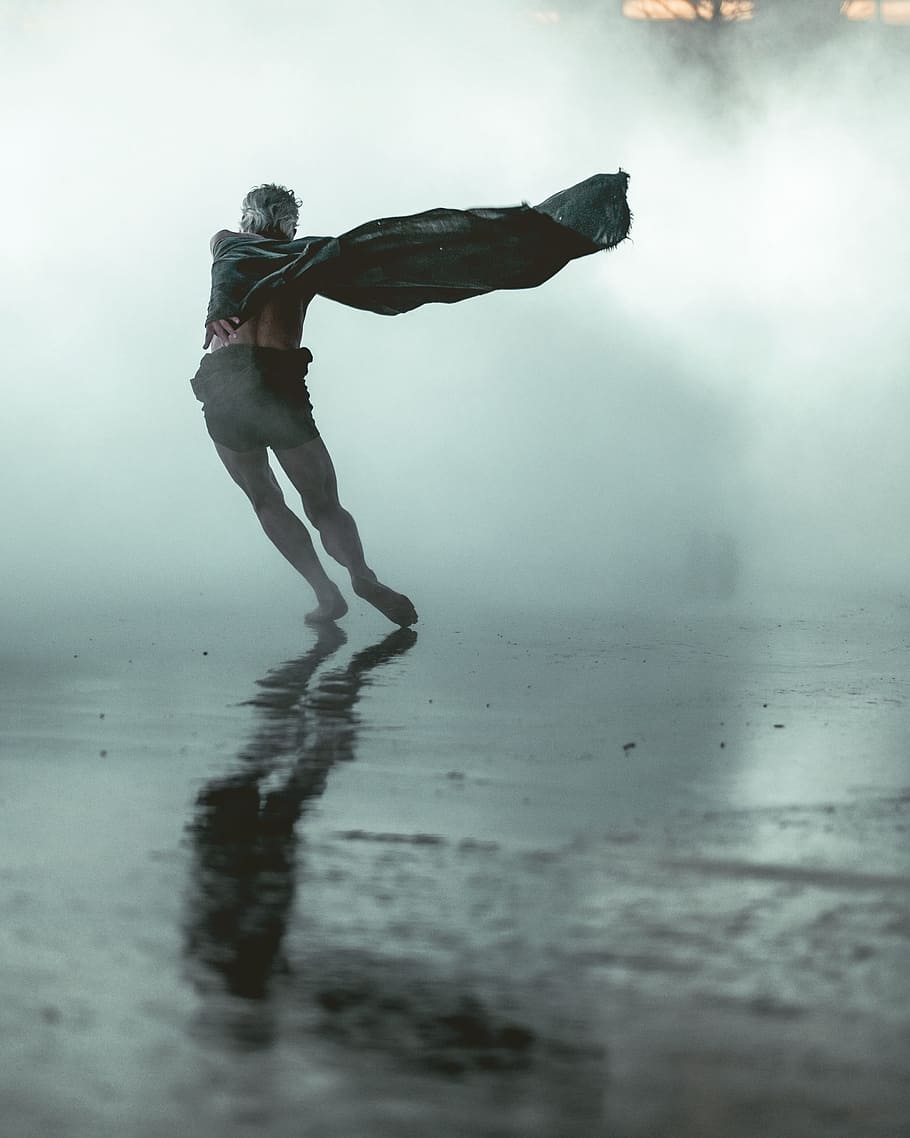 man on gray concrete road, white haired man wearing black cape and shorts standing on ground HD wallpaper