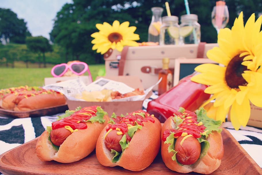 hotdogs with buns, food, bread, meal, table, outdoors, food and drink HD wallpaper