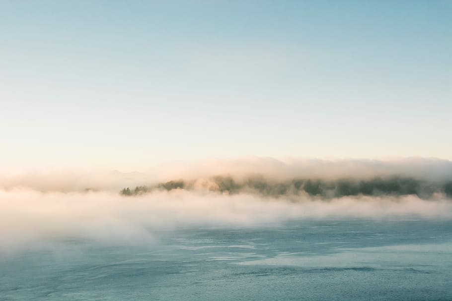 body of water under white clouds, landscape photography fog during daytime HD wallpaper
