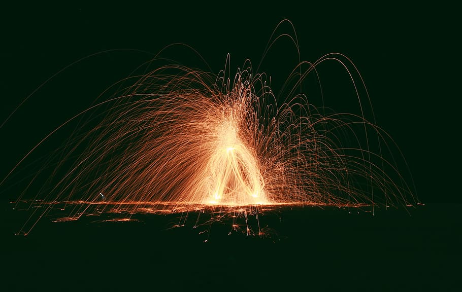 orange fireworks display, steel wool photography during night time HD wallpaper