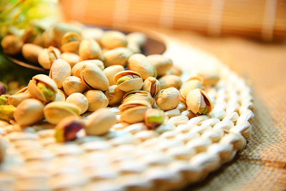 selective focus photography of cashew nuts, pistachio, kernel HD wallpaper