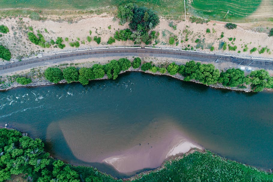 aerial photography of road beside body of water surrounded with trees, aerial photograph of river HD wallpaper
