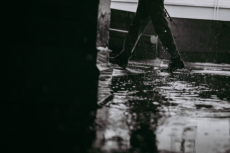 grayscale photo of water drop, grayscale photo of person walking on pathway with water HD wallpaper