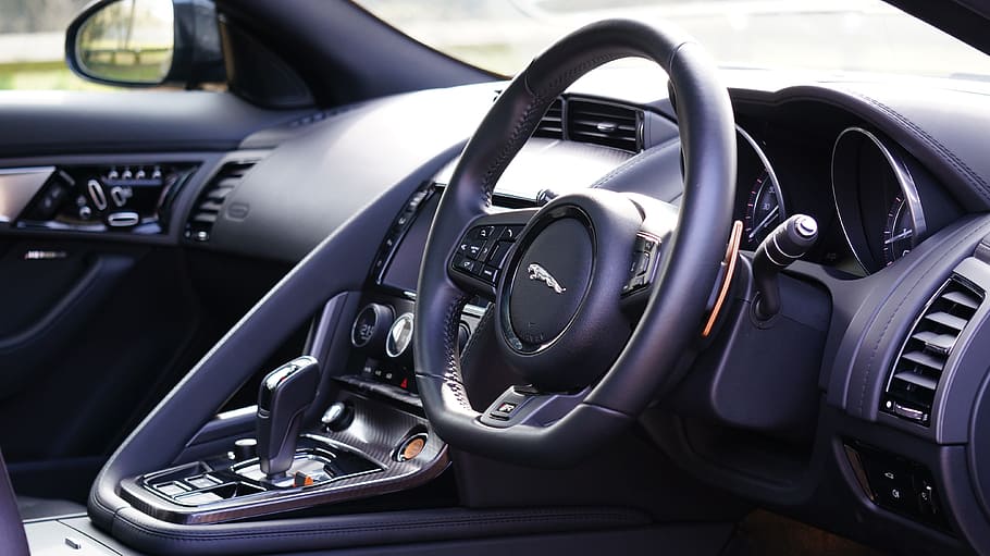 HD wallpaper: black Jaguar vehicle steering wheel, sports car, fast