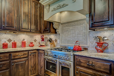 red ceramic jar on countertop near silver gas range oven, Kitchen HD wallpaper