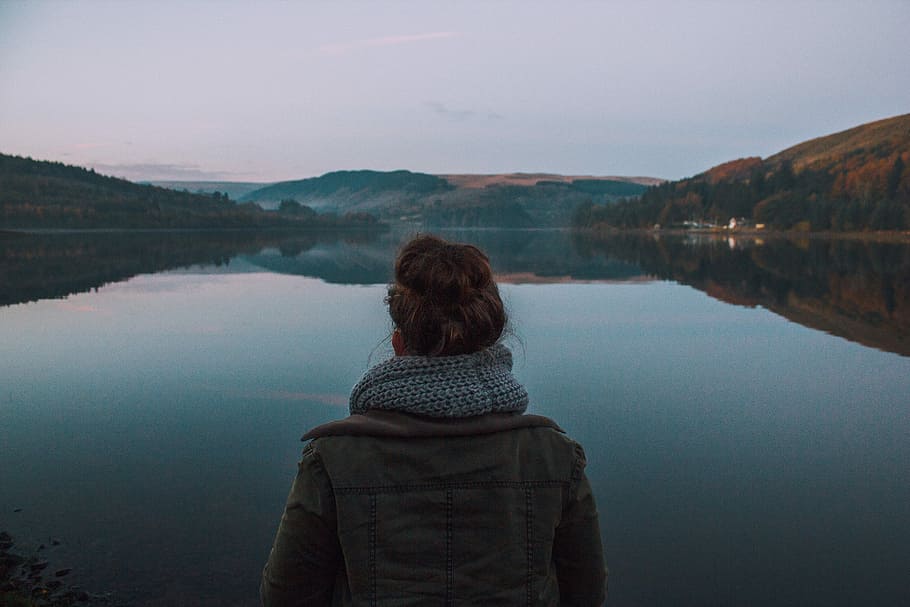 female facing lake wearing jacket, nature, women, outdoors, adult HD wallpaper
