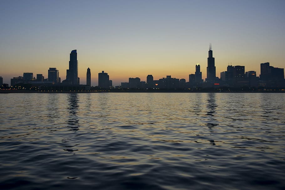 sunset, buildings, skyline, architecture, water, high rises HD wallpaper
